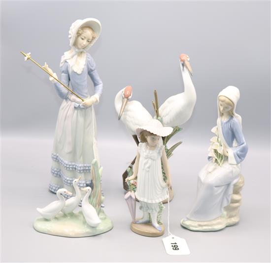 Lladro group of two storks and four other figures (2 a.f)